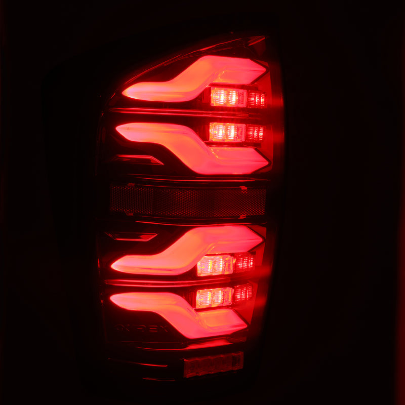 AlphaRex 16-21 Toyota Tacoma LUXX LED Taillights Blk/Red w/Activ Light/Seq - 680000