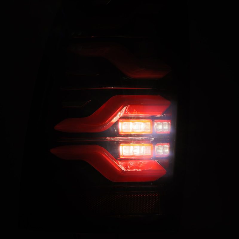 AlphaRex 05-15 Toyota Tacoma LUXX LED Taillights Blk/Red w/Activ Light/Seq - 680070