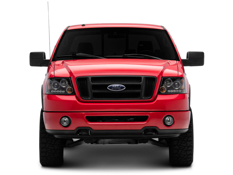 Raxiom 04-08 Ford F-150 Dual LED Halo Projector Headlights- Black - T542827