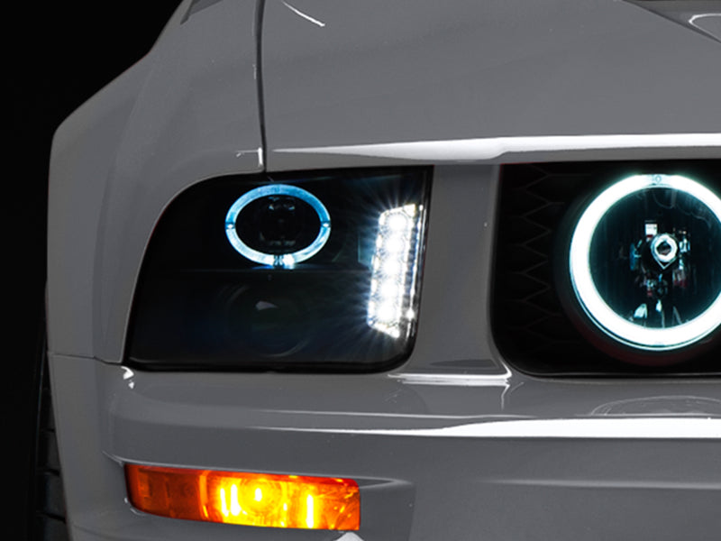 Raxiom 05-09 Ford Mustang w/ Halogen LED Halo Prjctr Headlights-Blk - 49128