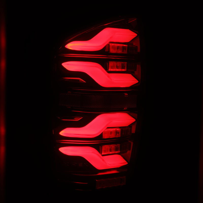 AlphaRex 16-21 Toyota Tacoma LUXX LED Taillights Blk/Red w/Activ Light/Seq - 680000