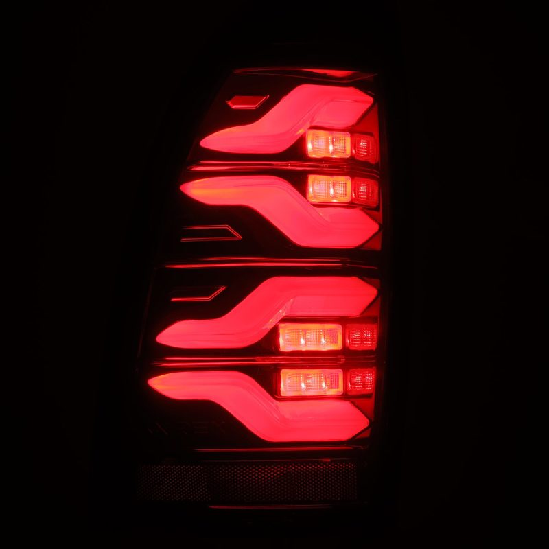AlphaRex 05-15 Toyota Tacoma LUXX LED Taillights Blk/Red w/Activ Light/Seq - 680070