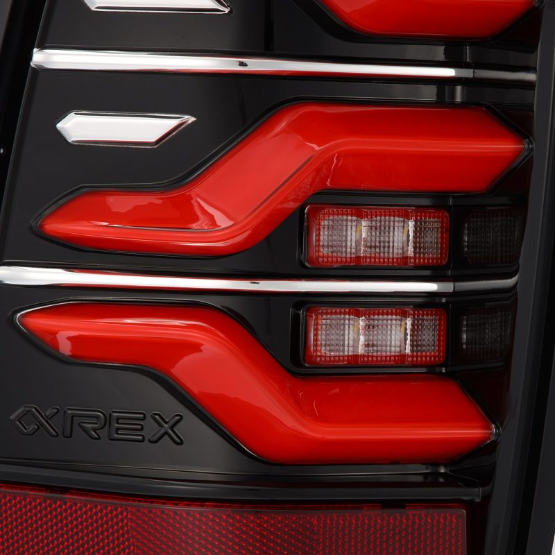 AlphaRex 05-15 Toyota Tacoma LUXX LED Taillights Blk/Red w/Activ Light/Seq - 680070