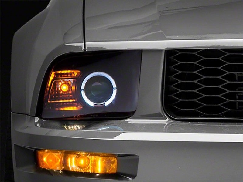 Raxiom 05-09 Ford Mustang Halogen 2010 Style LED Halo Headlights-Blk - 101682