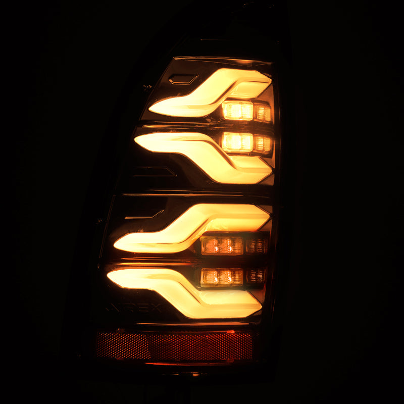 AlphaRex 05-15 Toyota Tacoma LUXX LED Taillights Alpha Blk w/Activ - 680050