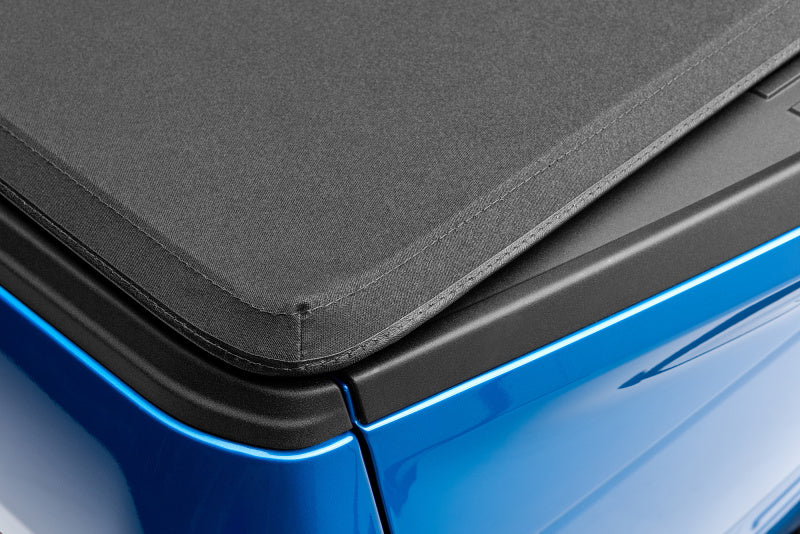 Lund 04-14 Ford F-150 (6.5ft. Bed) Genesis Elite Tri-Fold Tonneau - 95873