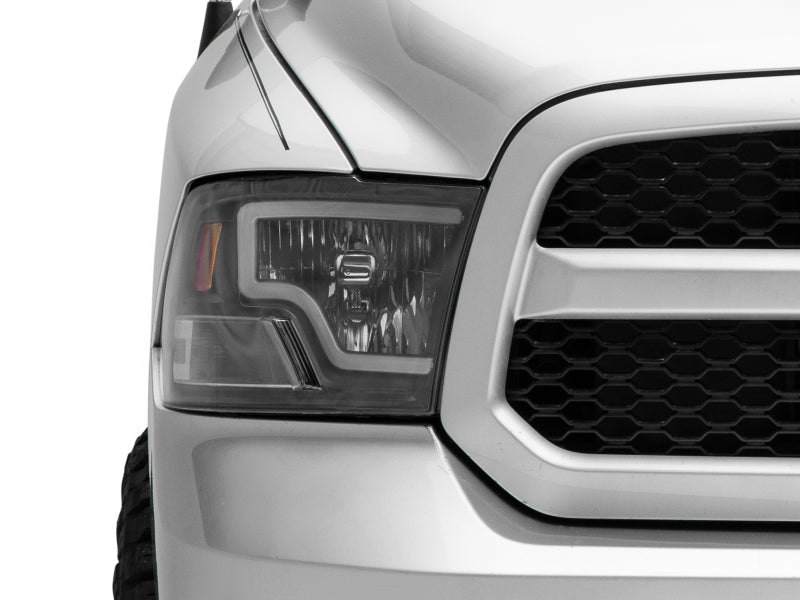 Raxiom 09-18 Dodge RAM 1500 LED Bar Headlights- Black Housing - R117803
