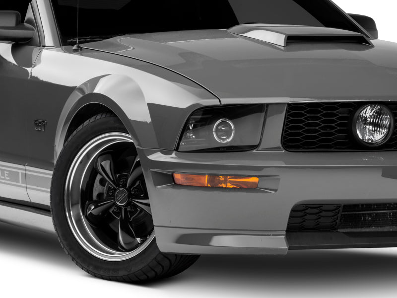 Raxiom 05-09 Ford Mustang Halogen 2010 Style LED Halo Headlights-Blk - 101682