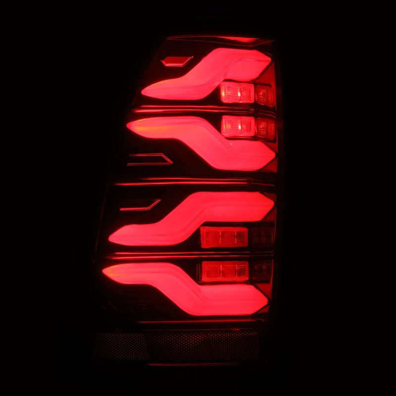 AlphaRex 05-15 Toyota Tacoma LUXX LED Taillights Blk/Red w/Activ Light/Seq - 680070