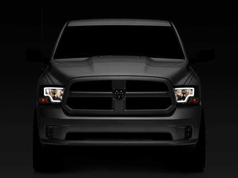 Raxiom 09-18 Dodge RAM 1500 LED Bar Headlights- Black Housing - R117803